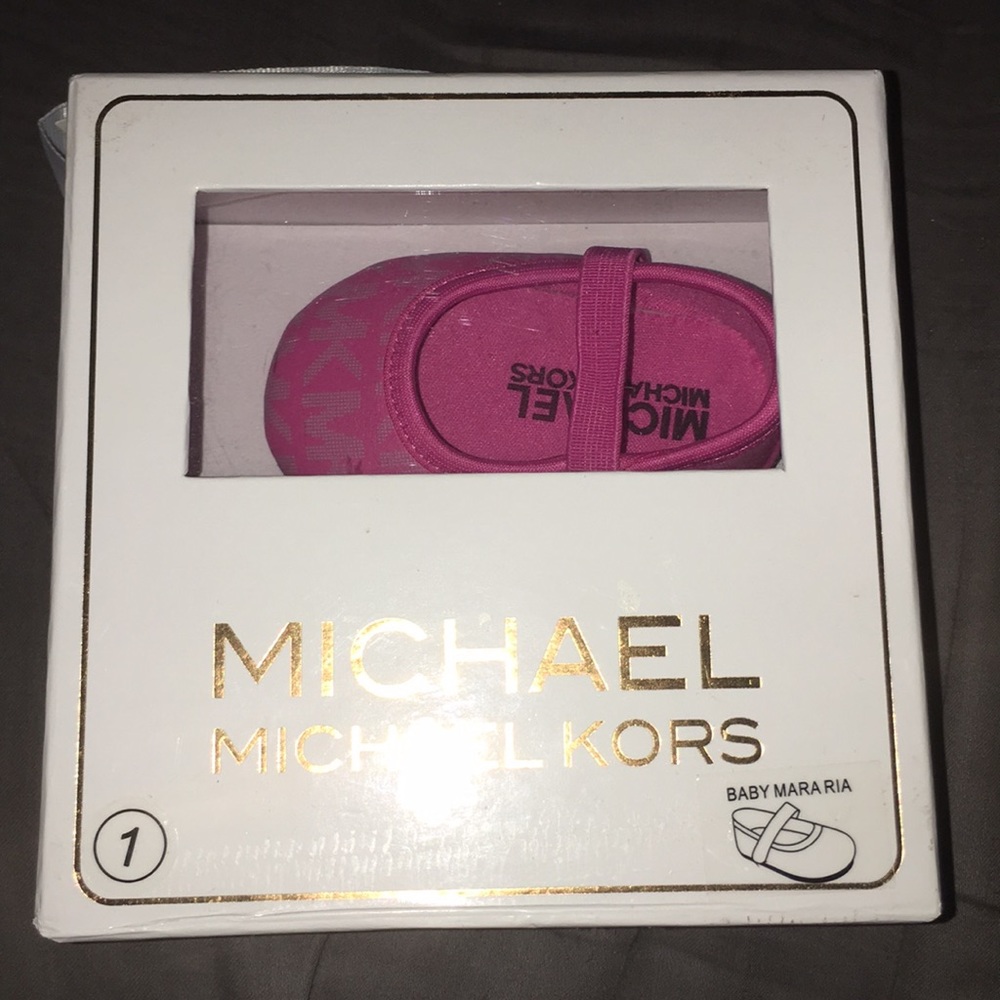 Micheal Kors pink baby flats
